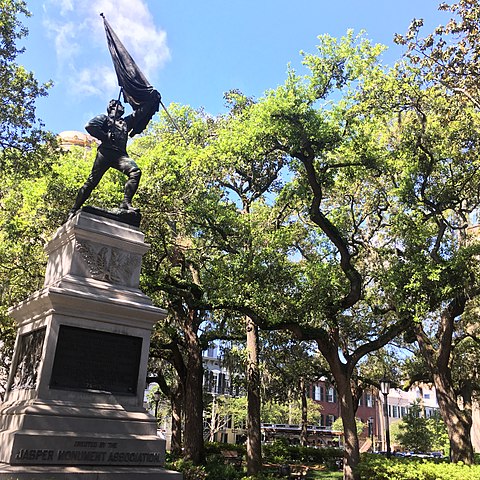 Statue of William Jasper among the trees of Madison Square